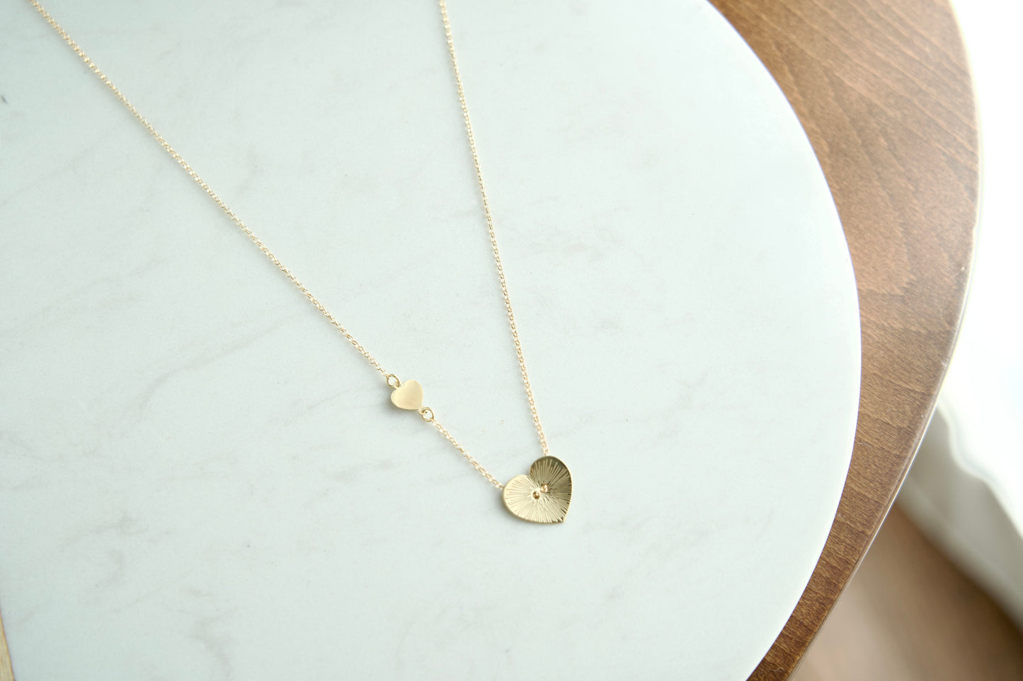 Heart ray necklace