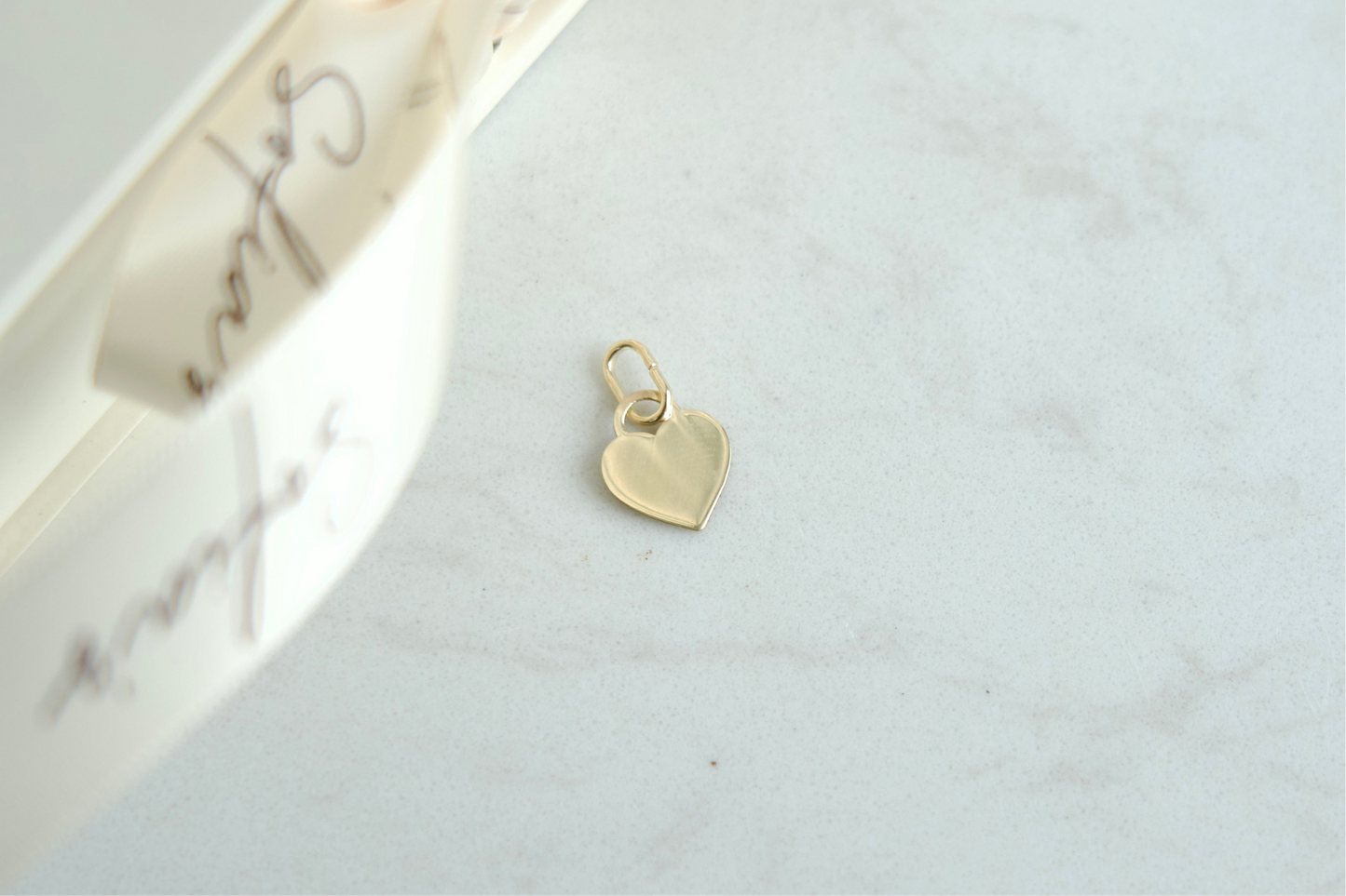 Micro heart charm